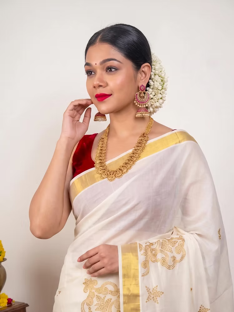 Golden Floral Embroidery Tussel Cotton Kasavu Saree