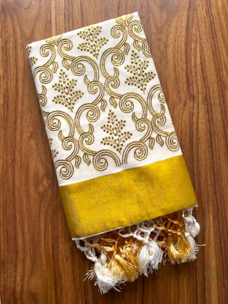 Golden Floral Embroidery Tussel Cotton Kasavu Saree