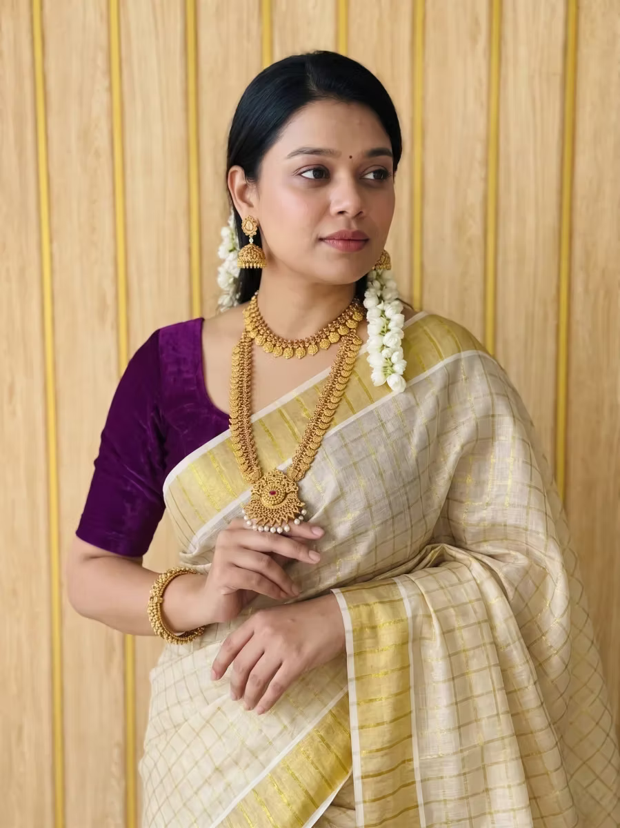 Golden Block Balaramapuram Kasavu Tissue Saree With Tussel