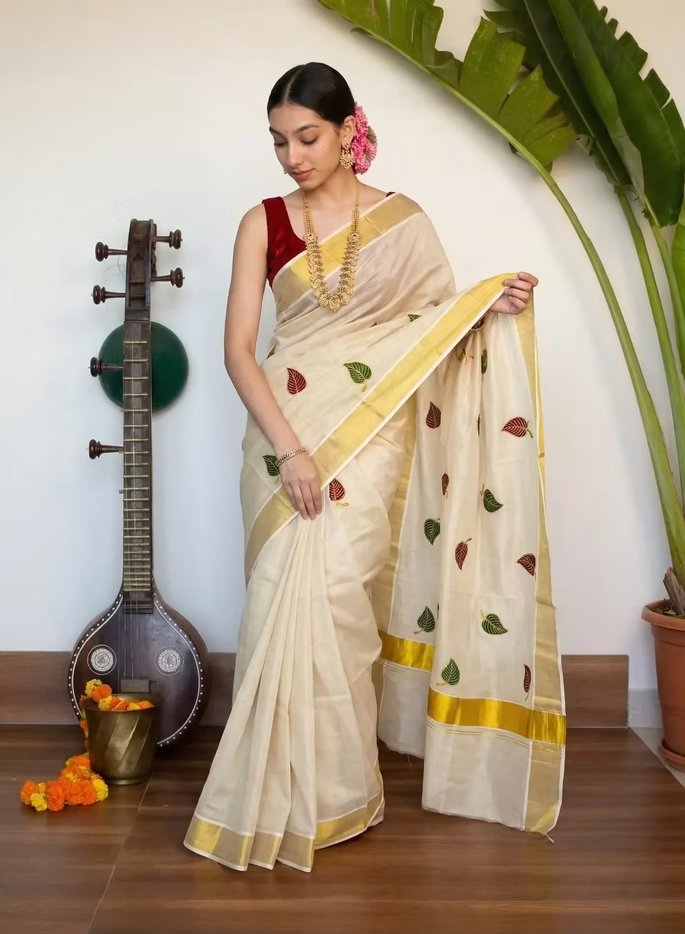 Green & Maroon Leaf Embroidery Golden Kasavu Tissue Saree With Running Blouse